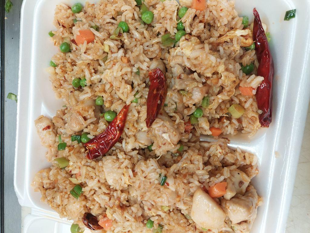 Fricken fried. Rice · Jasmine rice tossed With onion peas&carrots egg  and soy sauce
