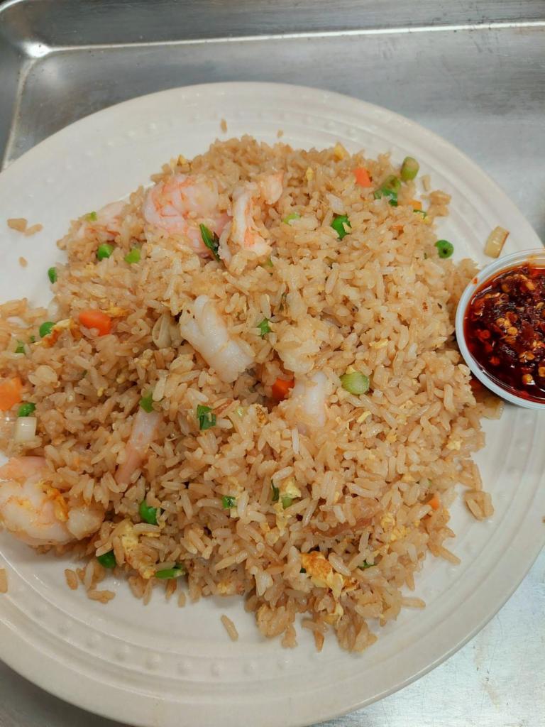 Shrimp fried rice · Jasmine rice tossed With onion peas&carrots egg  and soy sauce