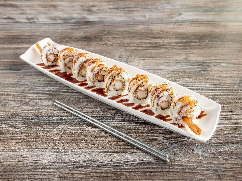 S11. Sakura Roll · Crab, avocado, cucumber, shrimp, tempura topped with eel sauce and spicy mayo sauce.