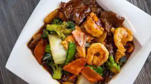 G23. Triple Delight · Hot and spicy. Chicken, beef, shrimp, with broccoli, cabbage, carrots, mushrooms, snow peas in spicy brown sauce.