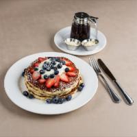 Berry Mascarpone Pancakes · Seasonal Blueberry , mascarpone almond cream.