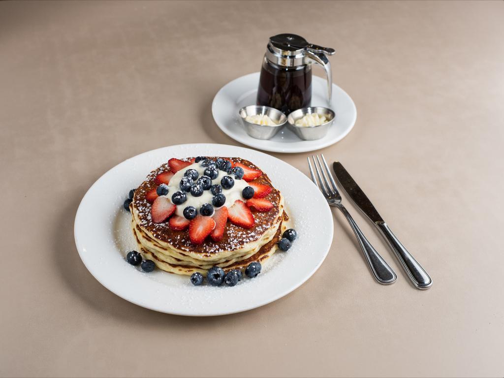 Berry Mascarpone Pancakes · Seasonal Blueberry , mascarpone almond cream.