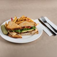 Chicken B.L.T.A Sandwich · Hormone free chicken breast, cherrywood bacon, guacamole, lettuce, tomato, country white.
