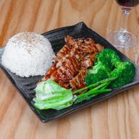 Chicken Teriyaki  · Grilled chicken, seasonal vegetables, teriyaki sauce, sesame, white rice