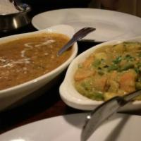 Daal Makhani · Black lentil dish cooked with fresh ginger, garlic and onions, garnished with shredded butte...