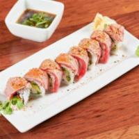 Tajima Roll. · Shrimp, avocado, kanikama, gobo, asparagus & kaiware; topped with tuna
tataki and served wit...