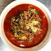 Yukgaejang Soup · Spicy soup with shredded beef, glass noodles, and egg.