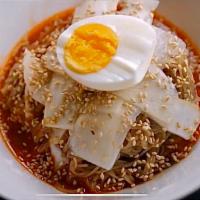 Bibim Neng Myun Noodle · Cold buckwheat noodle in sweet chili paste with sliced beef, hardboiled egg, and veggie.