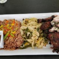 Jerk Smoked Chicken · With rice, peas and cabbage.