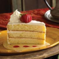 Tres Leches Cake · Mexican 3 layered cake of cream, sweetened condensed milk, and evaporated milk served on bed...