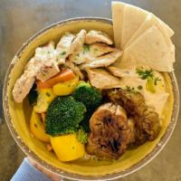 SHAWARMA CHICKEN Bowl · Grilled Chicken breast topped with Tahini Garlic Sauce, served with roasted veggies, hummus ...