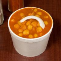 Channa Masala · Garbanzo beans spiced with fresh ginger and served in its own sauce. Vegetarian. Does not co...