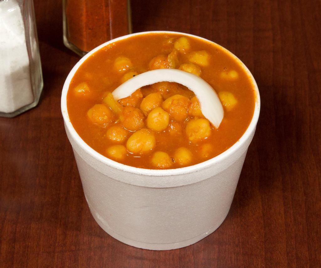Channa Masala · Garbanzo beans spiced with fresh ginger and served in its own sauce. Vegetarian. Does not come with rice.