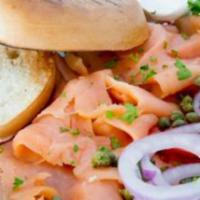 Lox & Cream Cheese Platter · Smoked salmon, sliced tomatoes, capers, red onions, cucumbers and cream cheese served with a...