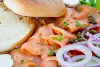 Lox & Cream Cheese Platter · Smoked salmon, sliced tomatoes, capers, red onions, cucumbers and cream cheese served with a toasted bagel.