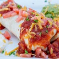 Breakfast Burrito · Scrambled eggs with ham, onions, green peppers, tomatoes, and refried beans, wrapped in a fl...