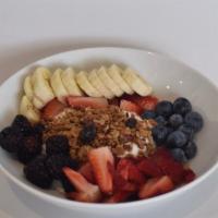 Housemade Granola Parfait · Served with low-fat Greek yogurt and fresh berries.