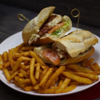 Chicken Sandwich · Grilled chicken breast lettuce, tomato, homemade tartar sauce, bacon, mozzarella cheese and ...
