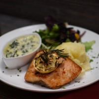 Grilled Salmon · Served with mash potato and creamy spinach.