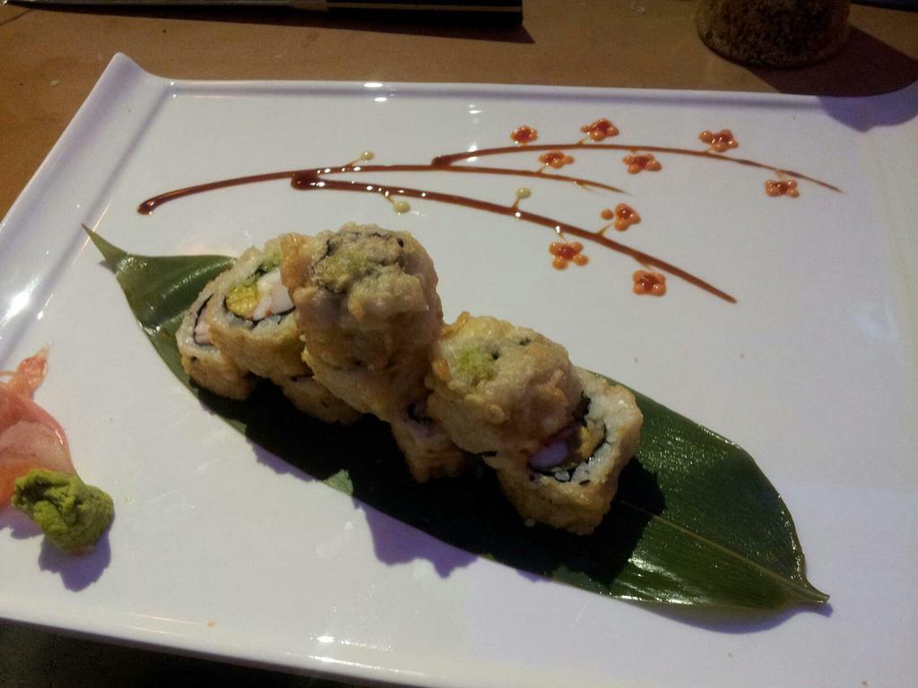 Mayflower Roll · Inside; shrimp, crab meat, avocado. Outside; roll fried in tempura batter, with spicy mayo and eel sauce. 