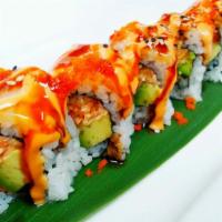 Snow White Roll · Inside; spicy crab meat, avocado. Outside; white tuna and caviar. 