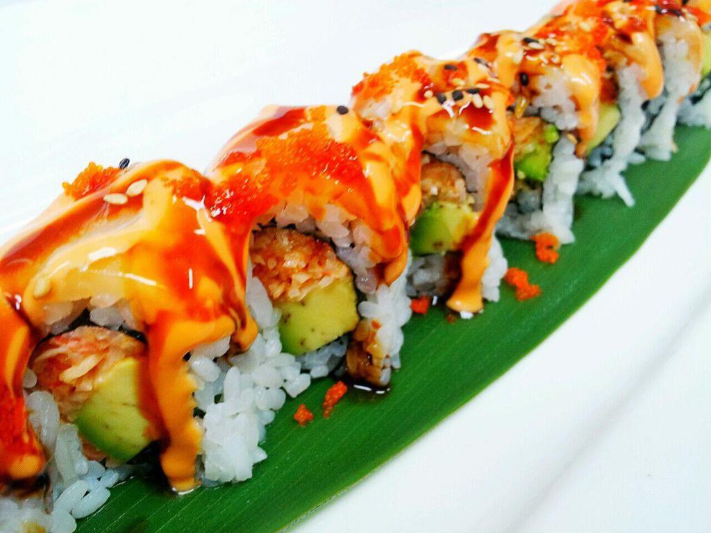 Snow White Roll · Inside; spicy crab meat, avocado. Outside; white tuna and caviar. 