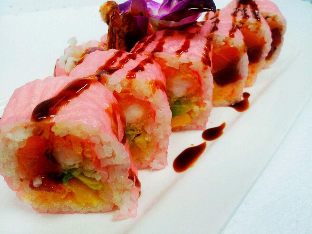 Shangerila Roll · Shrimp tempura, tuna, salmon, lobster salad, avocado, mango in pink soy paper. 
