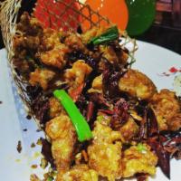 Hot and spicy Crispy Chicken · Crispy fried chicken chunks w. Dry pepper, pepper corn and many other seasoning. Spicy.