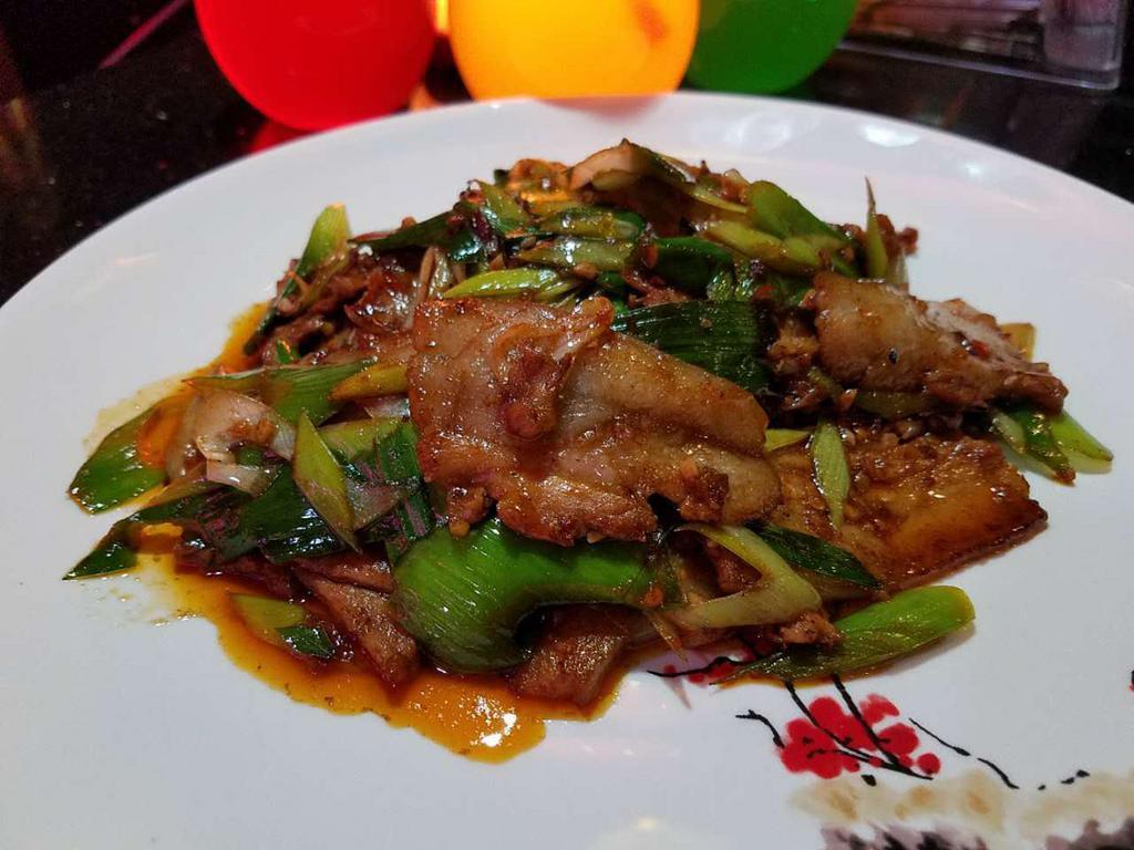Double sautéed pork Belly · Thinly sliced pork belly , leek, pepper in spicy Szechuan sauce