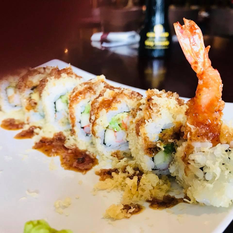 Double Crunchy Roll · Shrimp tempura, imitation crab mix, cucumber, avocado, crunchy tempura, topped with more crunchy tempura and eel sauce.