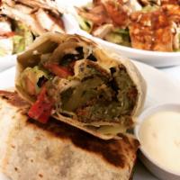 Falafel Wrap · Falafel, hummus, pickles and house salad wrapped in a flatbread and toasted on the griddle. ...