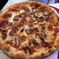 Classic Combo Pizza · Caramelized onions, roasted bell peppers, roasted mushrooms, black Mediterranean olives, hou...