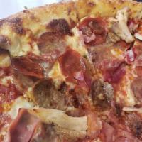 Pork Reigns Pizza · House braised pork, house made sausage, ham, guanciale, applewood smoked bacon and salame ca...