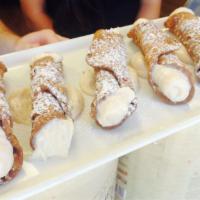 Cannoli · Traditional Sicilian dessert. Crispy tube shaped shell filled with sweetened ricotta and aro...