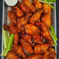 Buffalo Wings · Voted Best in Charlotte. Crispy fried jumbo wings tossed in your choice of sauce and served ...