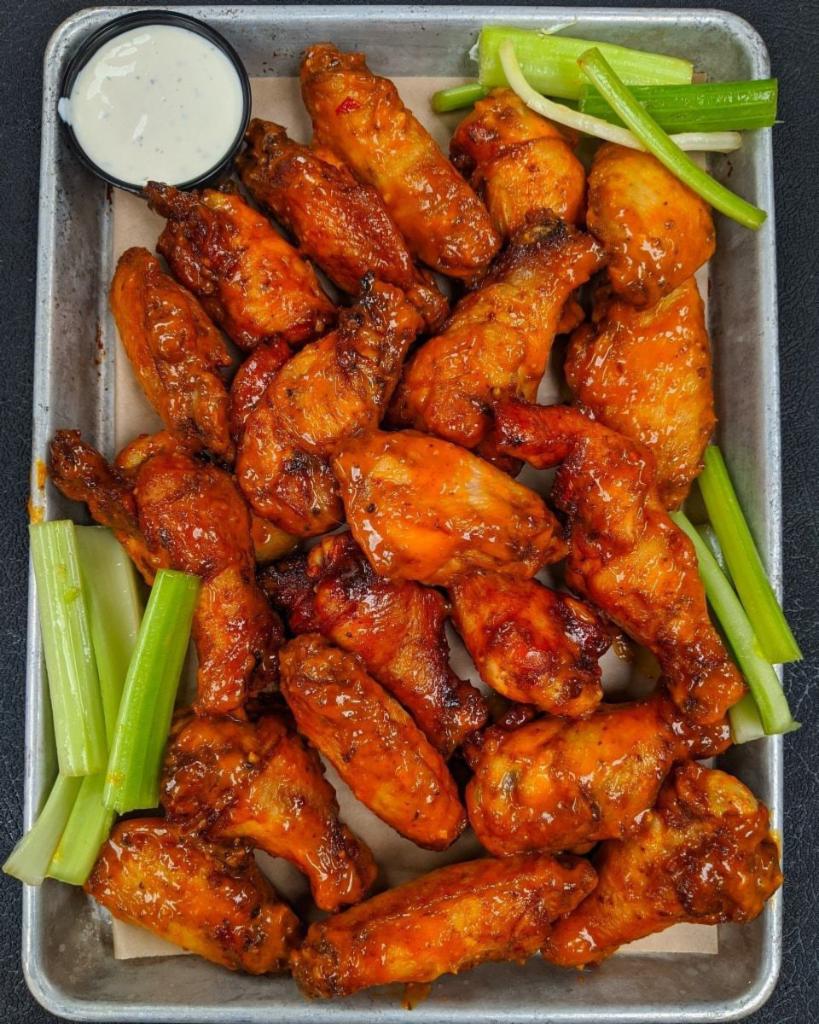 Buffalo Wings · Voted Best in Charlotte. Crispy fried jumbo wings tossed in your choice of sauce and served with celery and blue cheese or ranch. (No all flats/drums modifications)