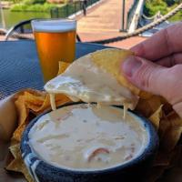 Crab con Queso · Billy’s world-famous spicy cheese and crab dip served with fresh tortilla chips.