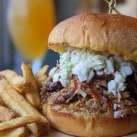 Southern BBQ Pork Sandwich · This little piggy went to the smoker… Pulled pork with an Eastern Carolina BBQ sauce and slaw.