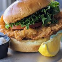Fried Flounder Sandwich · On a brioche bun with lettuce, tomato and tartar sauce.