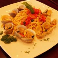 Linguini and Clams · Littleneck clams steamed with fresh basil in a garlic and extra virgin olive oil or marinara...