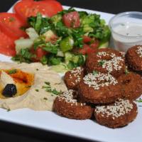 Falafel · Chickpeas, cilantro, onion and garlic, mixed and fried, served with fresh vegetables, tahini...