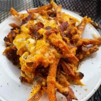 Loaded Fries · Homemade fries covered in bacon and a blend of cheeses.