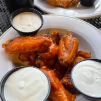 Buffalo Wings · Fried crisp, tossed in Mike's famous buttery Buffalo sauce. Add-ons for an extra charge.