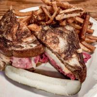 The Legit Reuben · The real deal here. Thin sliced corned beef, sauerkraut, Swiss cheese and Russian dressing o...