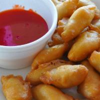 Sweet and Sour Chicken Combination · Sweetened sauce with  vinegar base.