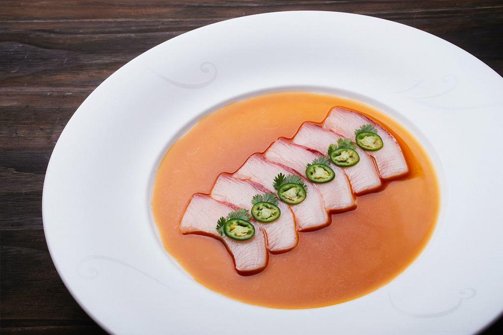 Yellowtail Jalapeno Sashimi · Thinly sliced yellowtail and jalapeno in special sauce.