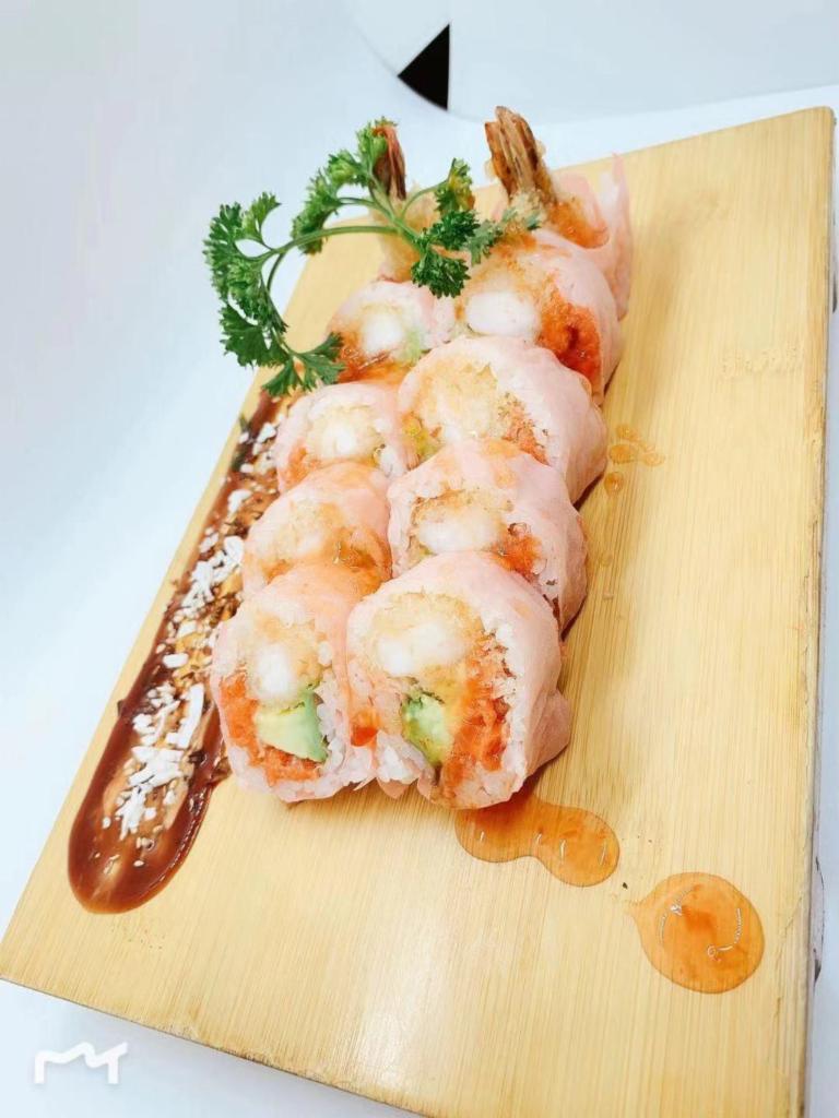 Sex on the beach（10Pc） · Two shrimp tempura ，avocado ， spicy tuna   ，with soy bean paper 。
 come with sweet chili sauce  on side。