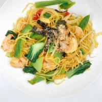Thai Curry Noodle · Steamed egg noodles, baichuai, mushroom, bell pepper, and scallion in Thai yellow curry sauce.