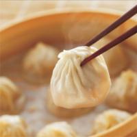 Pork Soup Dumplings · 6pc .   Original steamed Shanghai soupy dumplings with pork（Dumplings will take 15min for st...