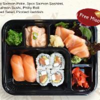L. Salmon Lover Bento · Creamy salmon poke, 3 salmon sashimi, 2 salmon sushi, philly roll, seaweed salad, pickled ra...